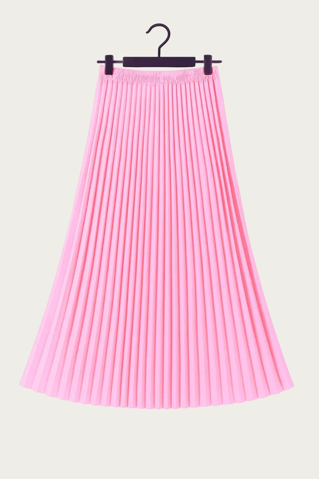 Jupe longue plissée rose vif suspendue sur cintre, tenue fluide et élégante pour un look EVJF.